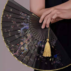 The Palace Museum Folding Fan with Hundred Birds Worshipping the Phoenix Motif