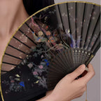 The Palace Museum Folding Fan with Hundred Birds Worshipping the Phoenix Motif